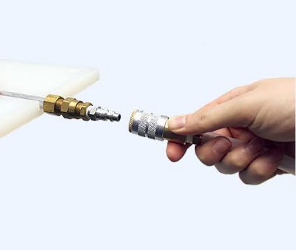 Hand making a sealed quick-disconnect connection